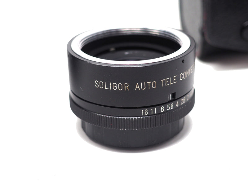 2 Soligor Pentax Camera Lenses with cases.